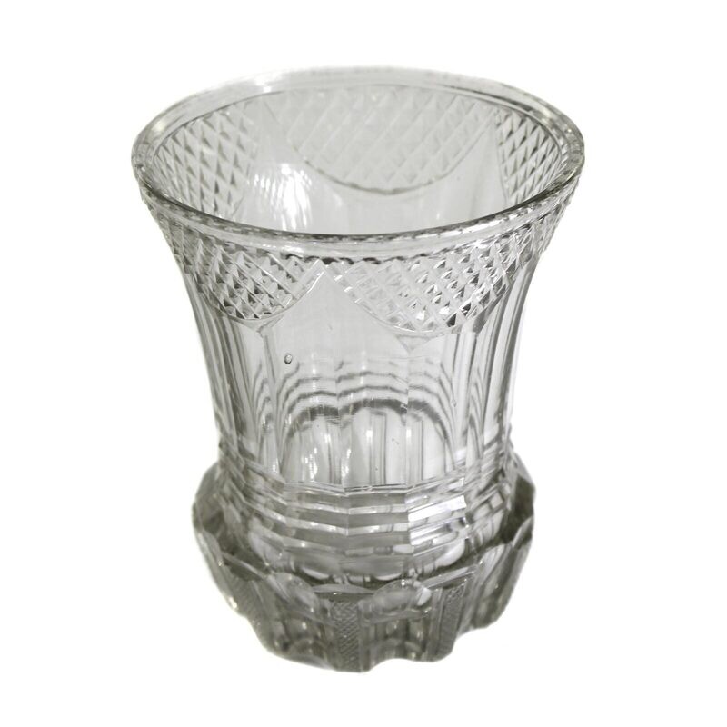 Small cup made of greyish glass with stoned arched fields, Russian
