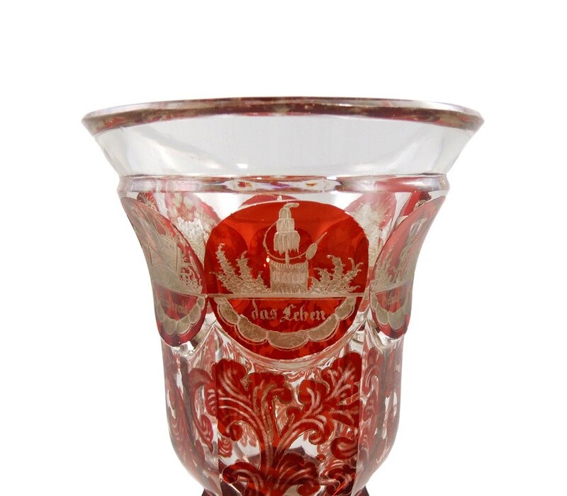 Red glazed footed cup with cut allegories, Josephinenhütte around 1845-55