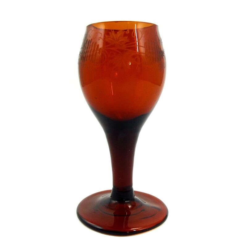 Amber-colored goblet with cut decoration, early 19th century.
​