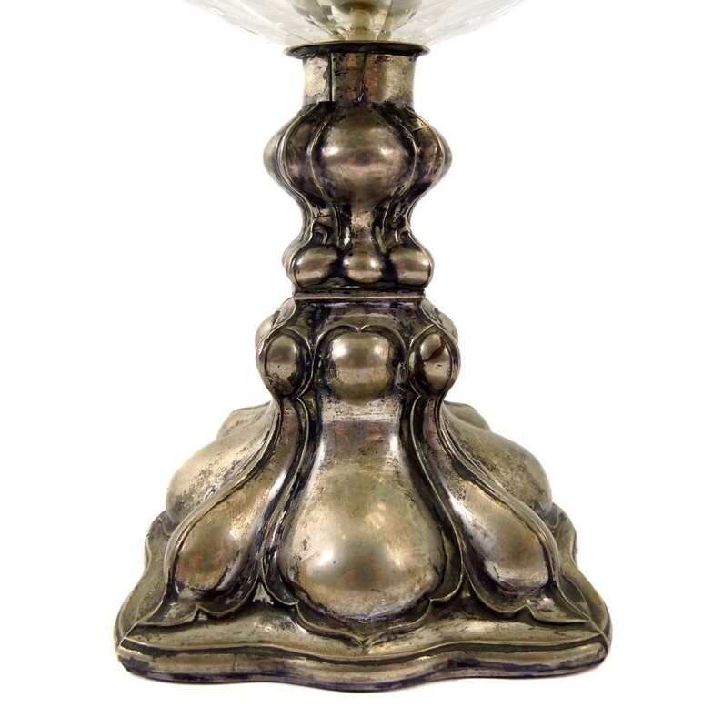 Centerpiece with embossed silver base and multi-faceted bowl body