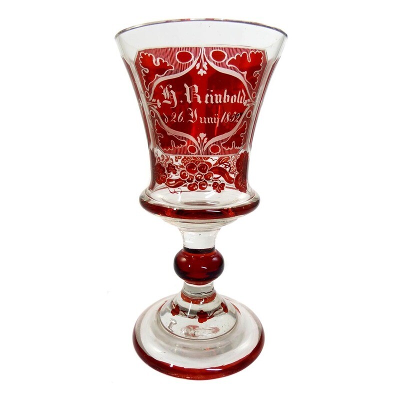 Biedermeier cup glazed ruby red with engraved symbols of good luck around 1850