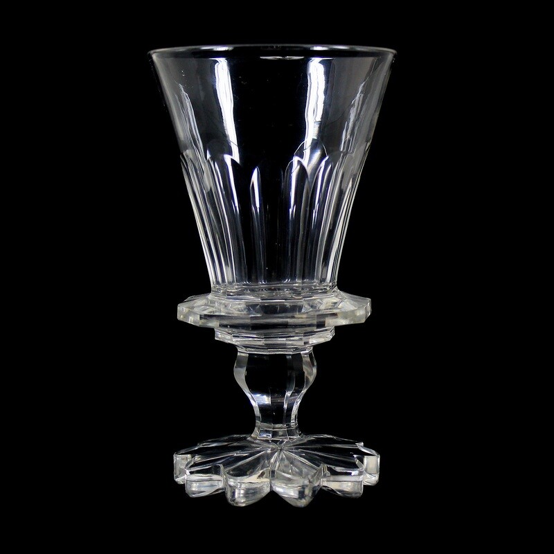 Magnificently faceted cup made of colorless glass with a roller-cut base, Bohemia