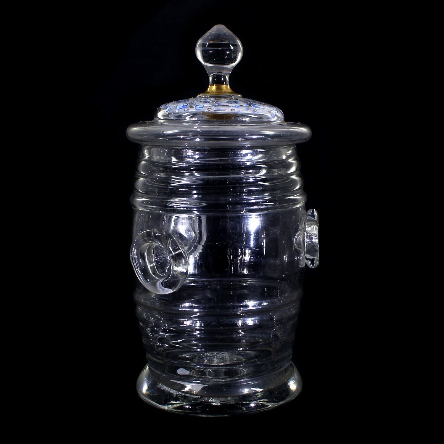 Thumb jar with lid and opaque enamel painting, base with demolition, 19th century.