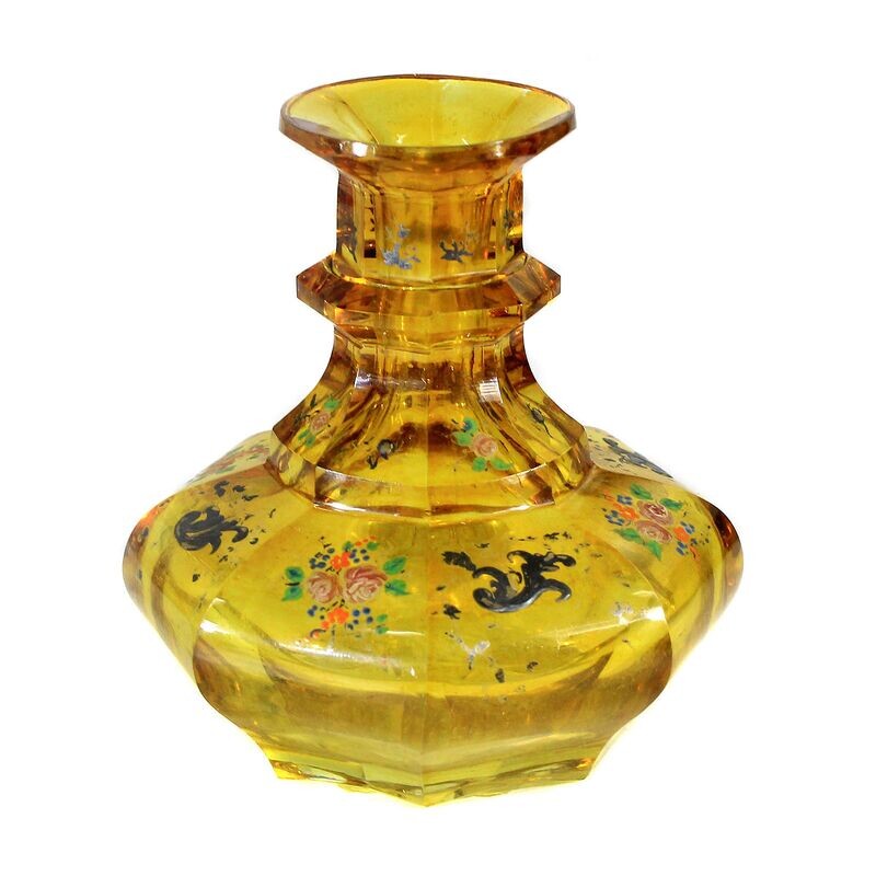 Bottle made of amber-colored glazed glass with floral decoration, Bohemia around 1840-50