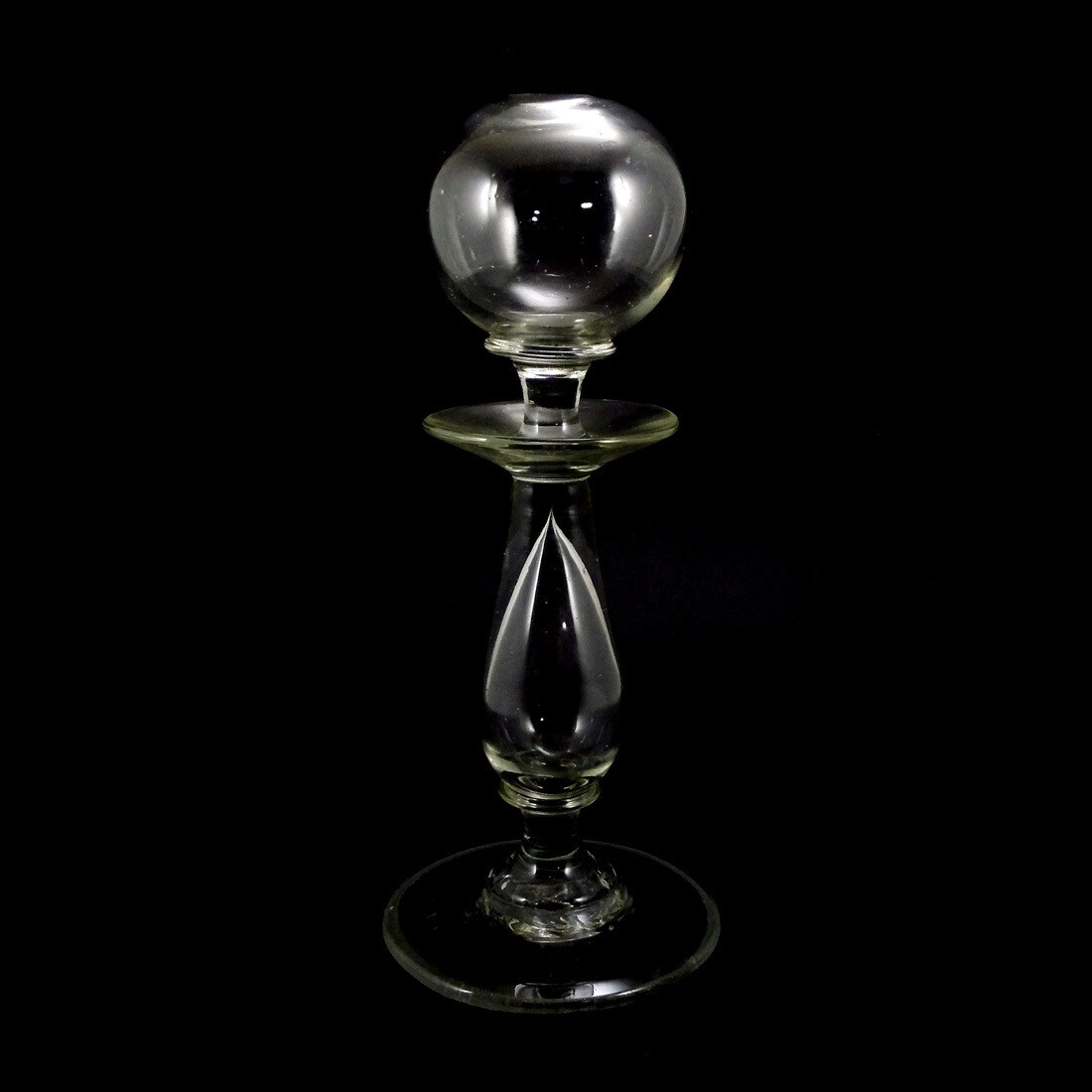Oil lamp made of colorless glass with hollow baluster shaft, 19th century.