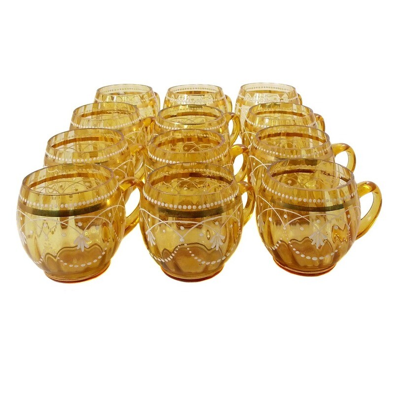 1st of 12. Handle mug made of honey yellow lustered glass with gold and enamel painting