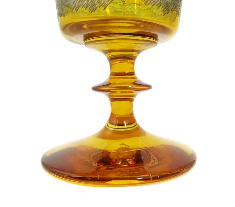 Large amber-colored glazed goblet with hunting deep-cut decoration.