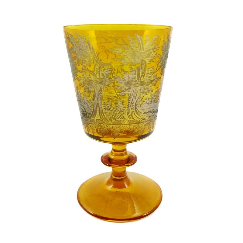 Large amber-colored glazed goblet with hunting deep-cut decoration.