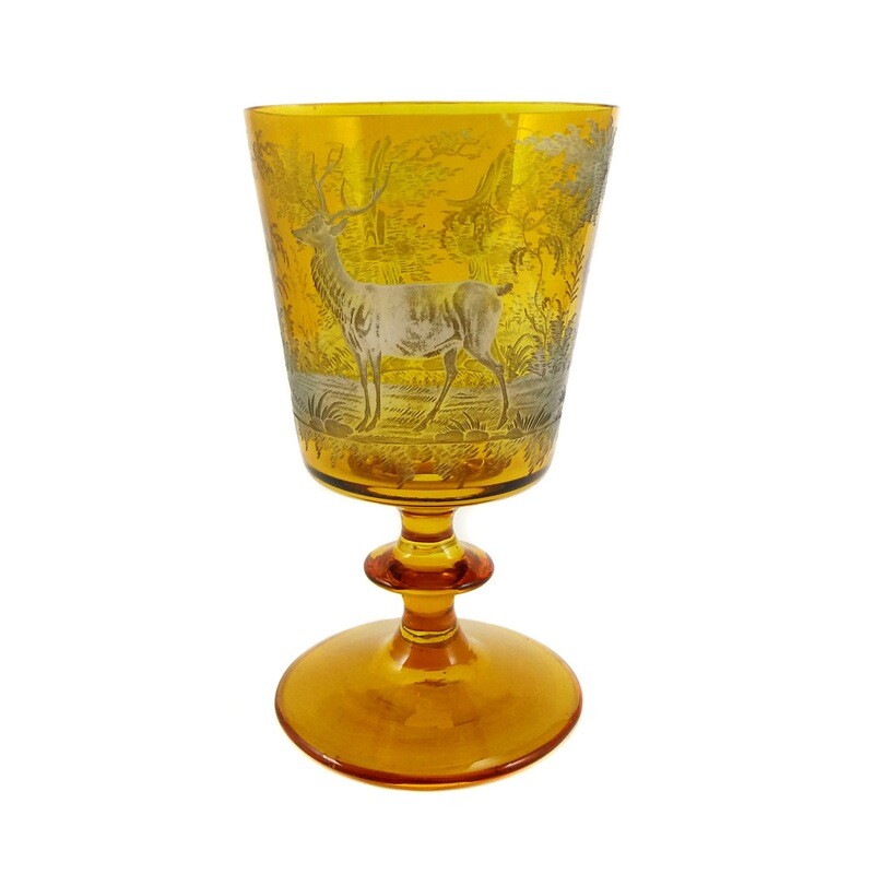 Large amber-colored glazed goblet with hunting deep-cut decoration.