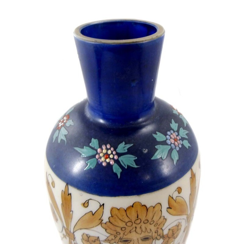 Large vase made of opaque white glass with blue background and mascarons, New World around 1870