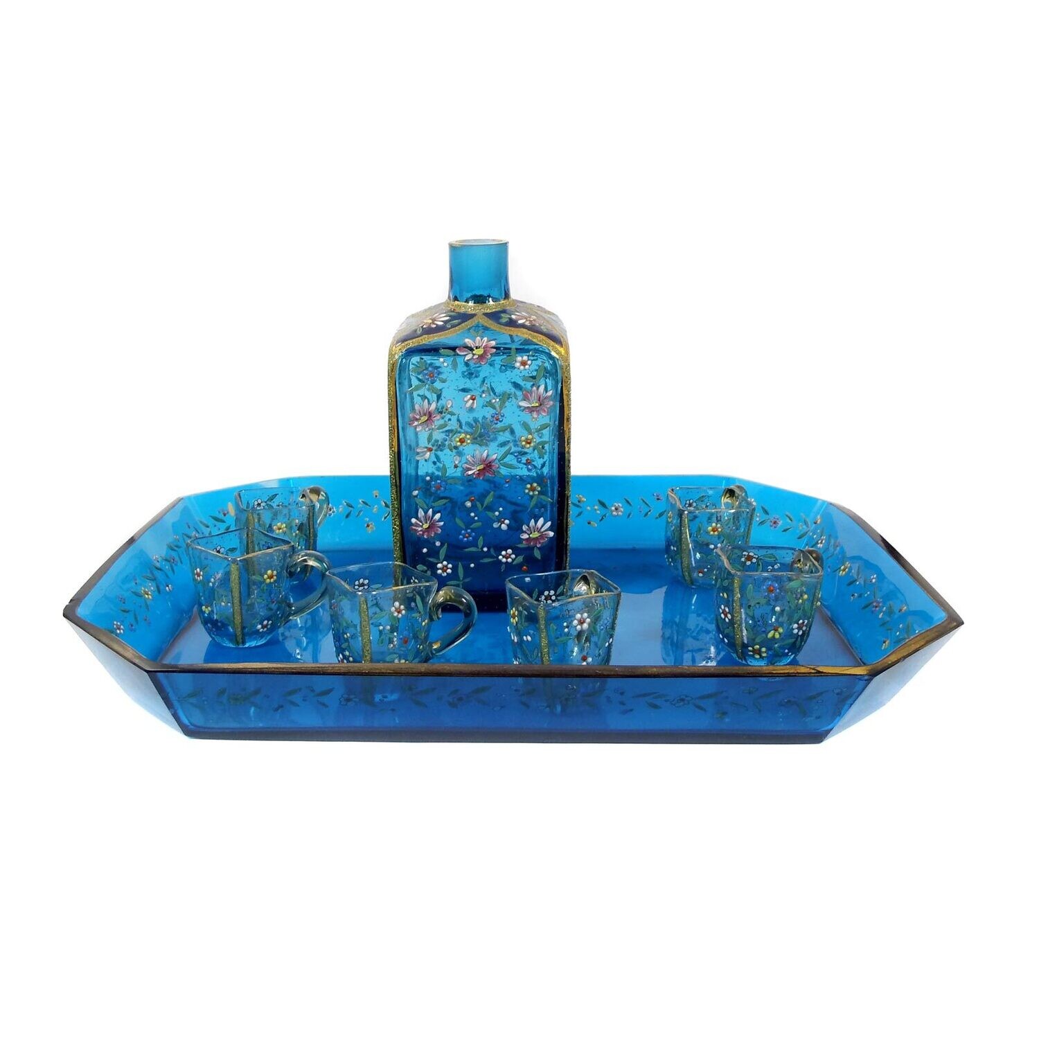 Liqueur service made of aquamarine blue glass with oriental decor in opaque enamel