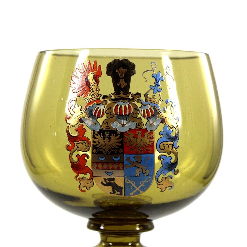 Romans made of green-brown crystal glass with coat of arms in opaque enamel around 188