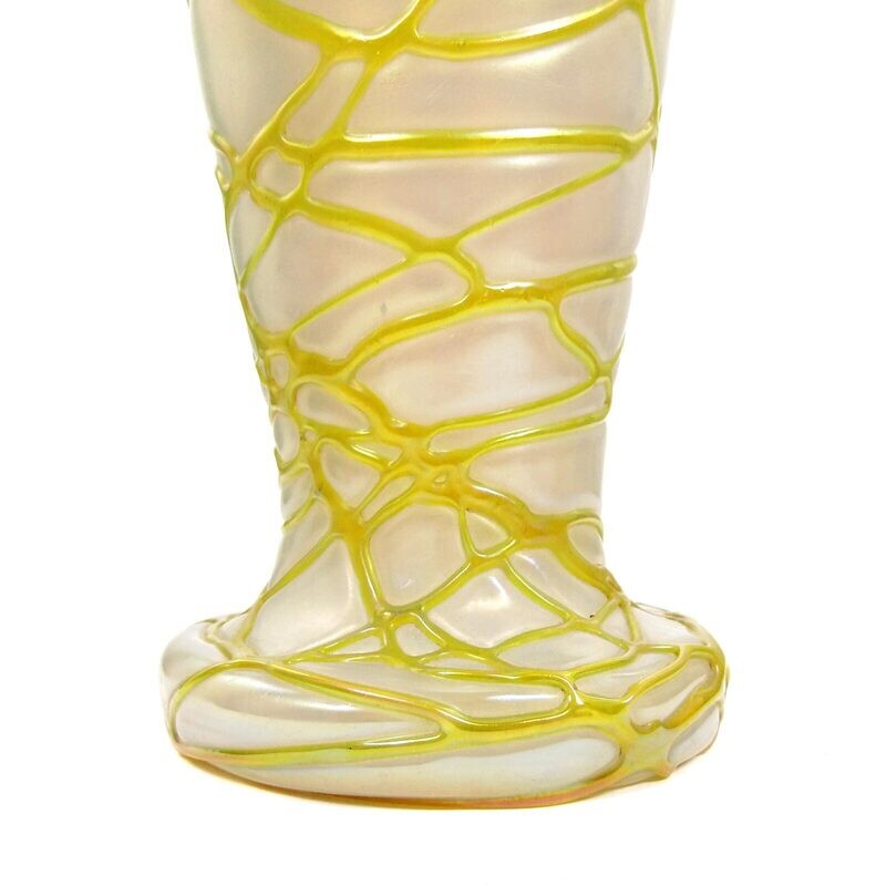 Large vase made of opaque white glass with silver-yellow braided glass threads