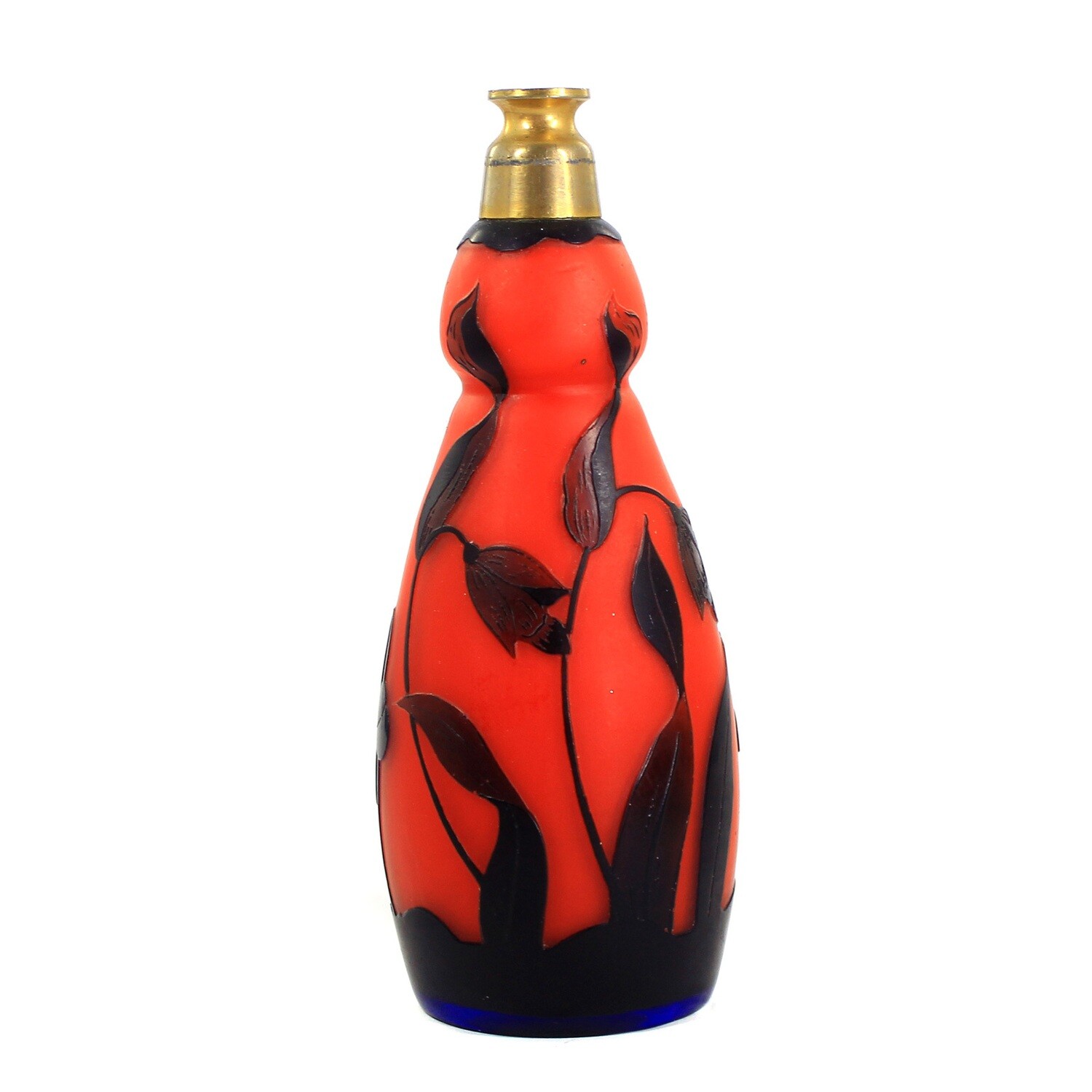 Perfume atomizer made of orange-red glass with blue overlay, probably New World