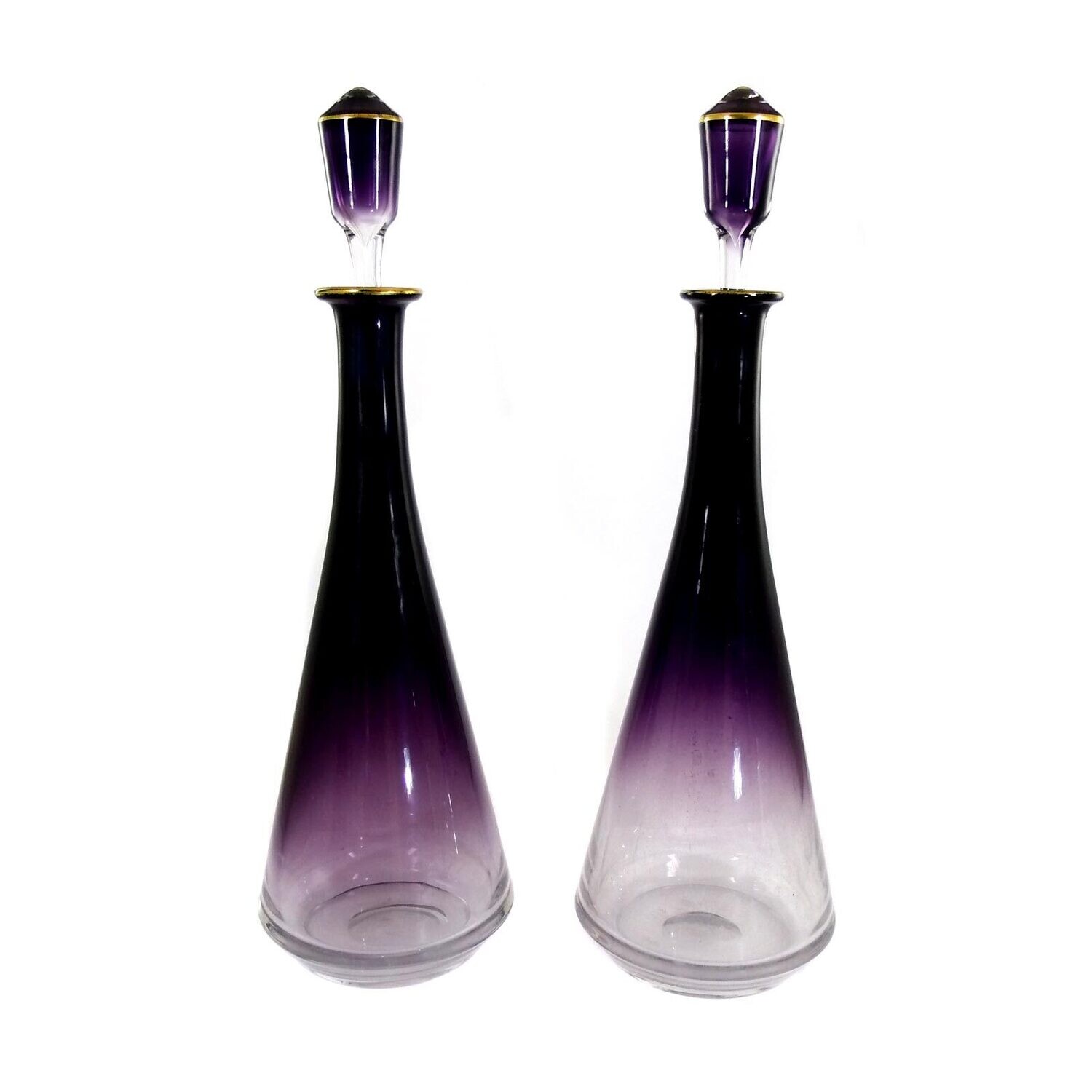 Pair of large carafes made of colorless glass with a violet base, Moser around 1890