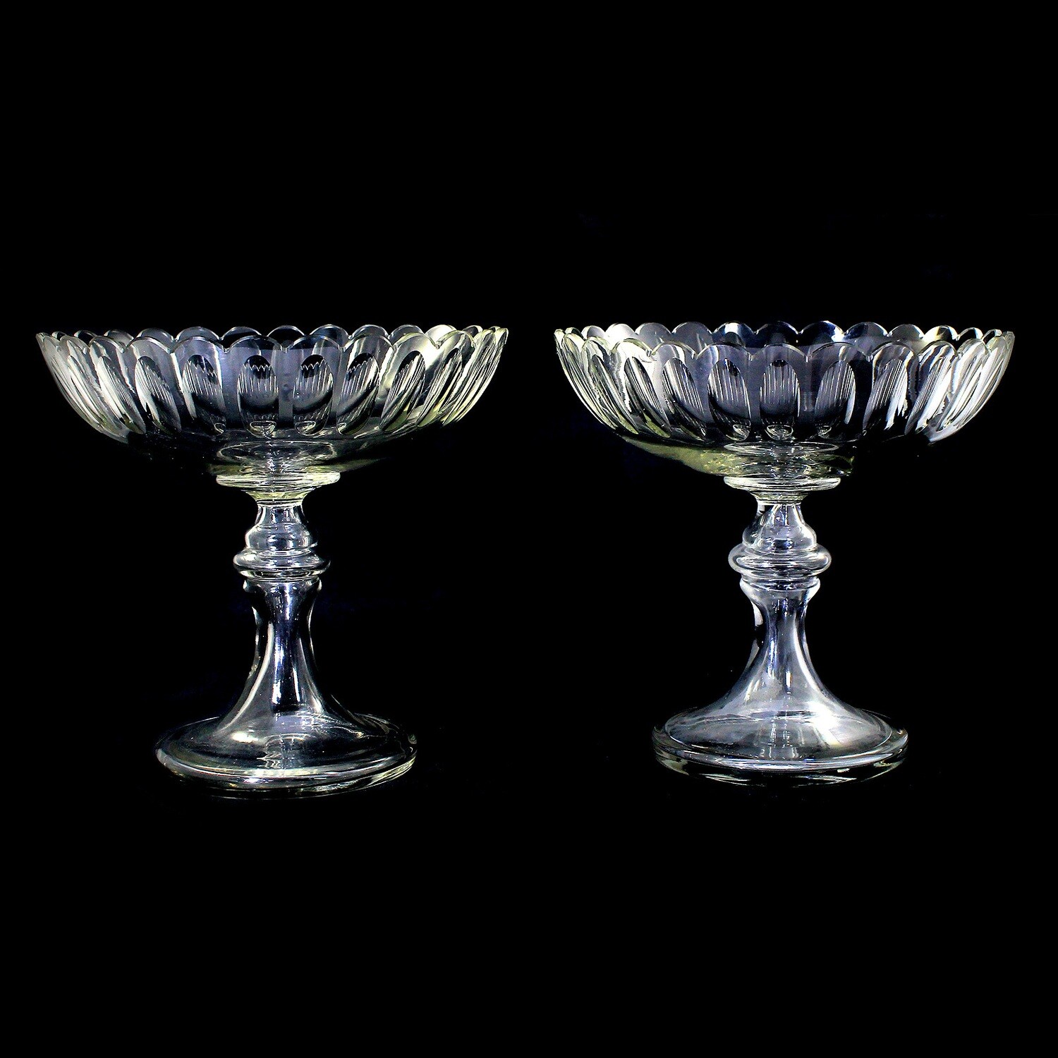 Pair of large footed bowls made of colorless crystal glass with lens cut, ca. 1890
​
