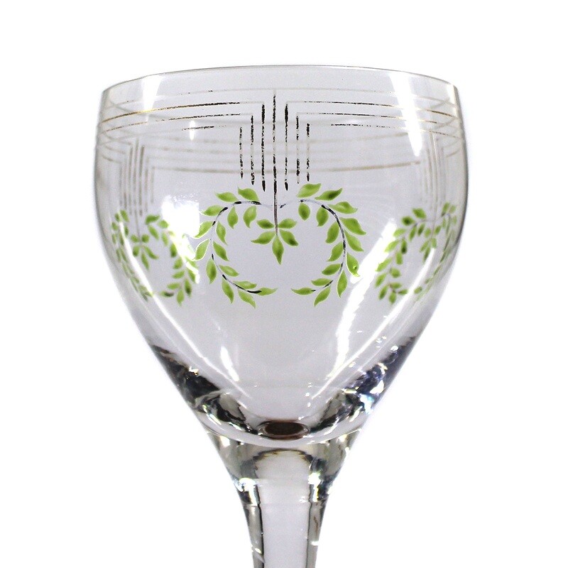 Stem glass with leaf wreath and geometric line ornament, rain hut