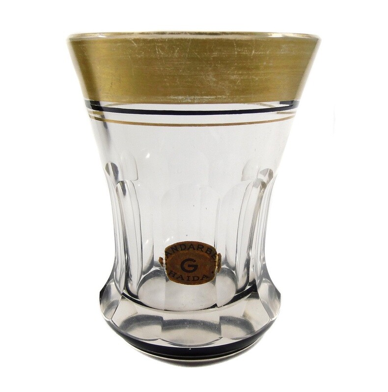 Beaker with curved facets and decor in gold and precious black, Goldberg, Haida