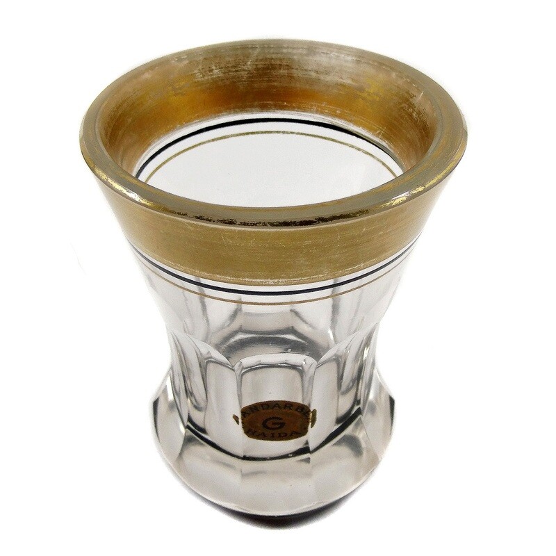 Beaker with curved facets and decor in gold and precious black, Goldberg, Haida