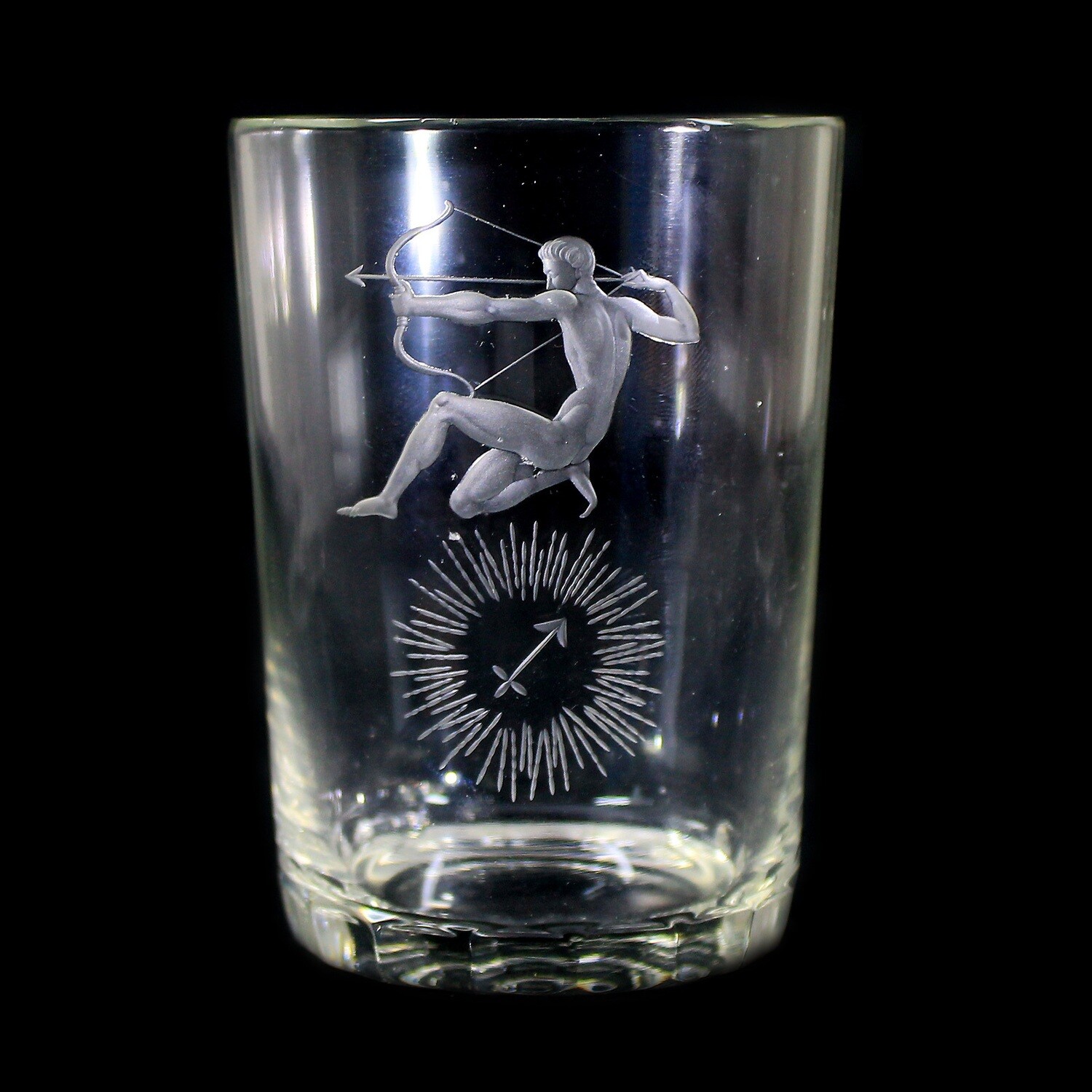 Cup made of colorless glass with the zodiac sign Sagittarius, Steinschönau around 1938