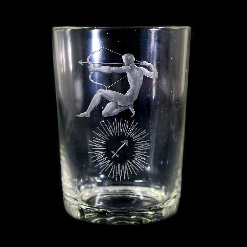 Cup made of colorless glass with the zodiac sign Sagittarius, Steinschönau around 1938