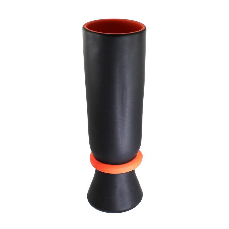 Tall vase made of black frosted glass with an orange interior, probably Simon Moore