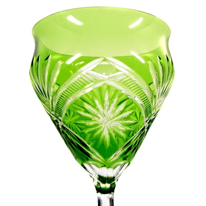 Stem glass with double-conical, faceted shaft and green overlay.