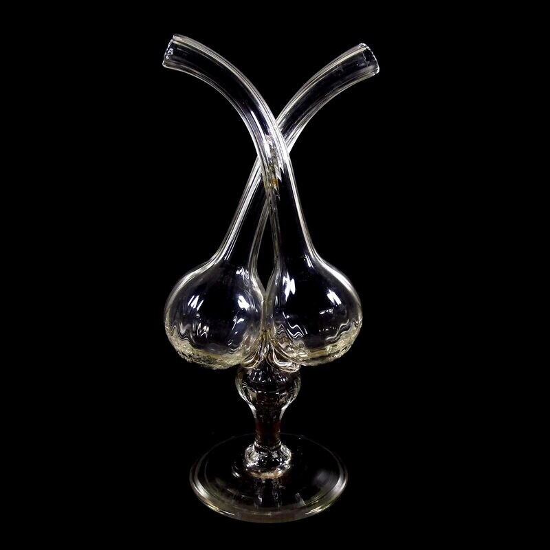 Vinegar and oil bottle made of colorless, ribbed glass, chipped tear-off.