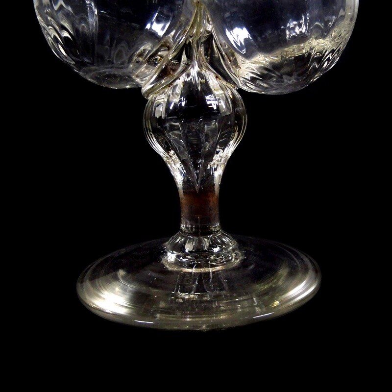 Vinegar and oil bottle made of colorless, ribbed glass, chipped tear-off.