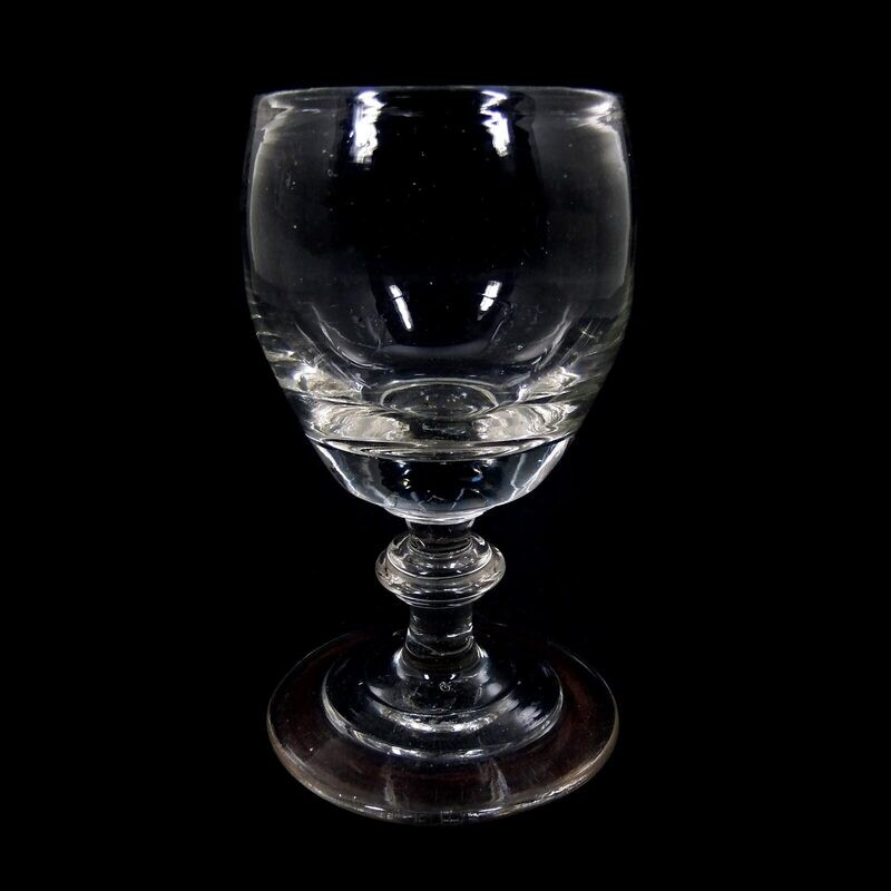 Goblet glass made of colorless glass with triple disc mode, North German 1st edition. 19th century