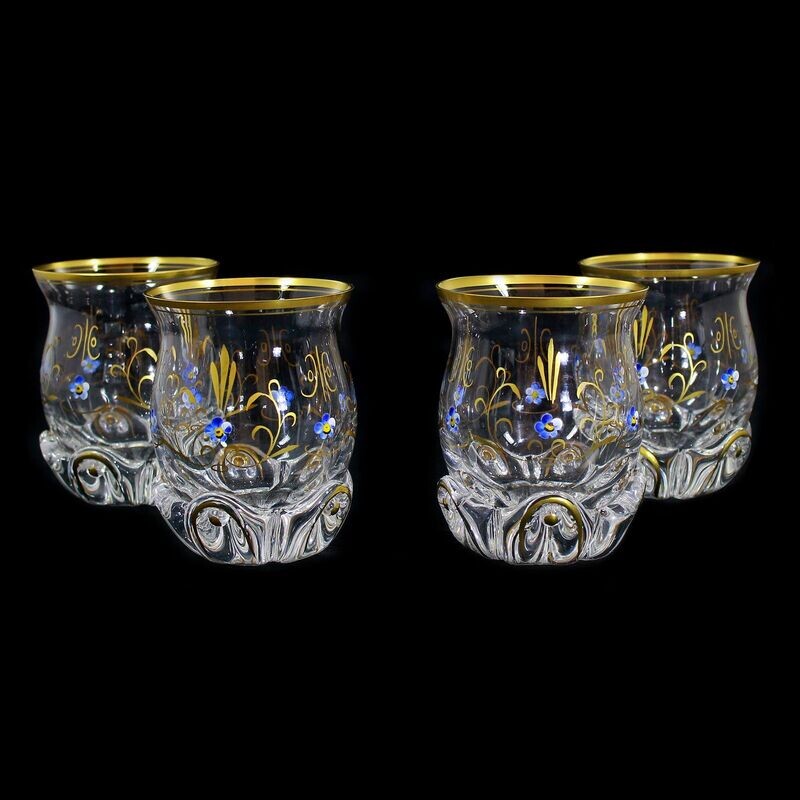 4 cups made of colorless crystal glass with bulbs and polished gold painting