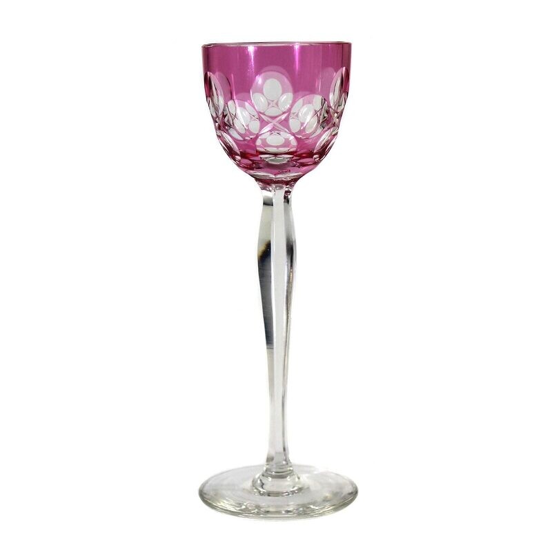 4 stem glasses with different colored bowls and peeled shafts.