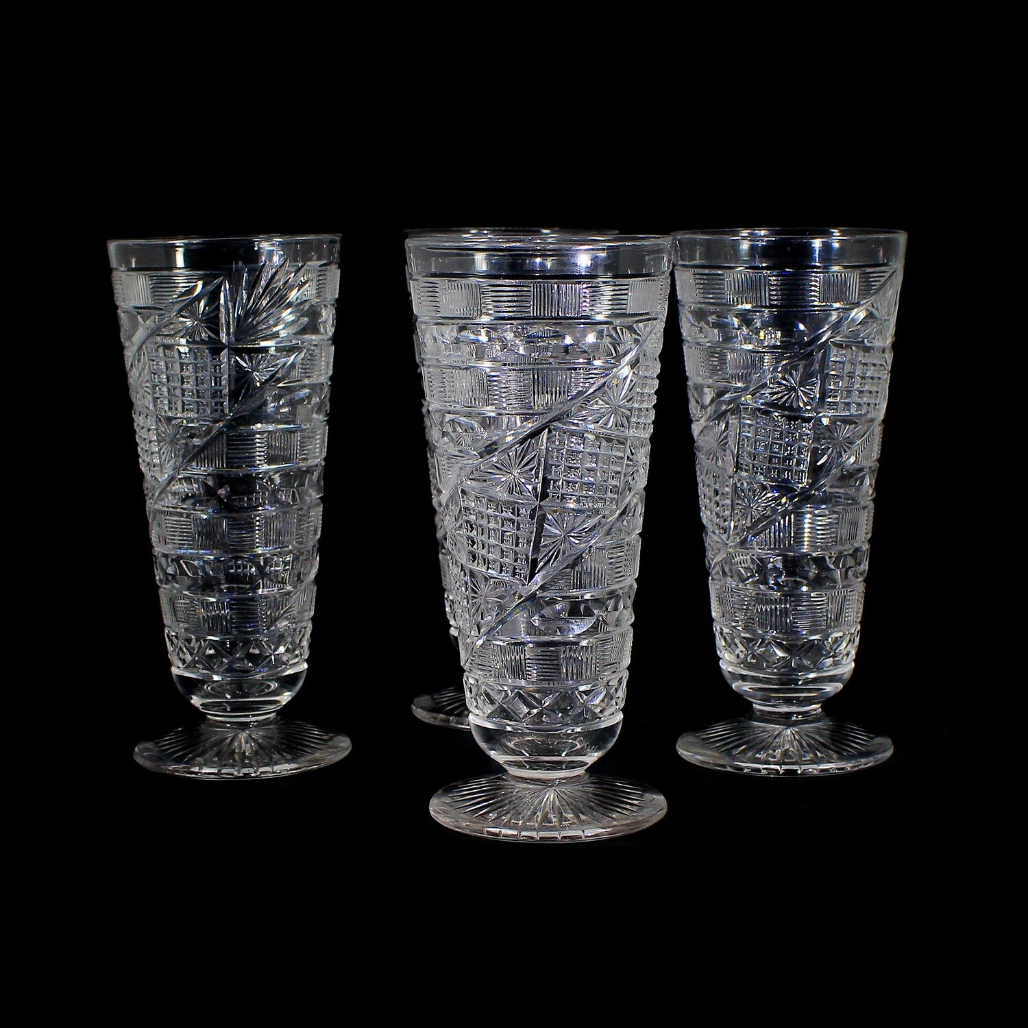 4 tall footed cups made of colorless crystal glass with elaborate cut decoration, Webb