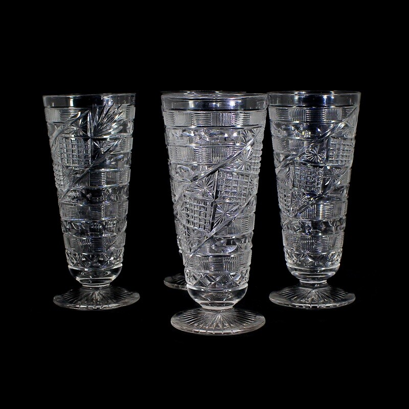 4 tall footed cups made of colorless crystal glass with elaborate cut decoration, Webb