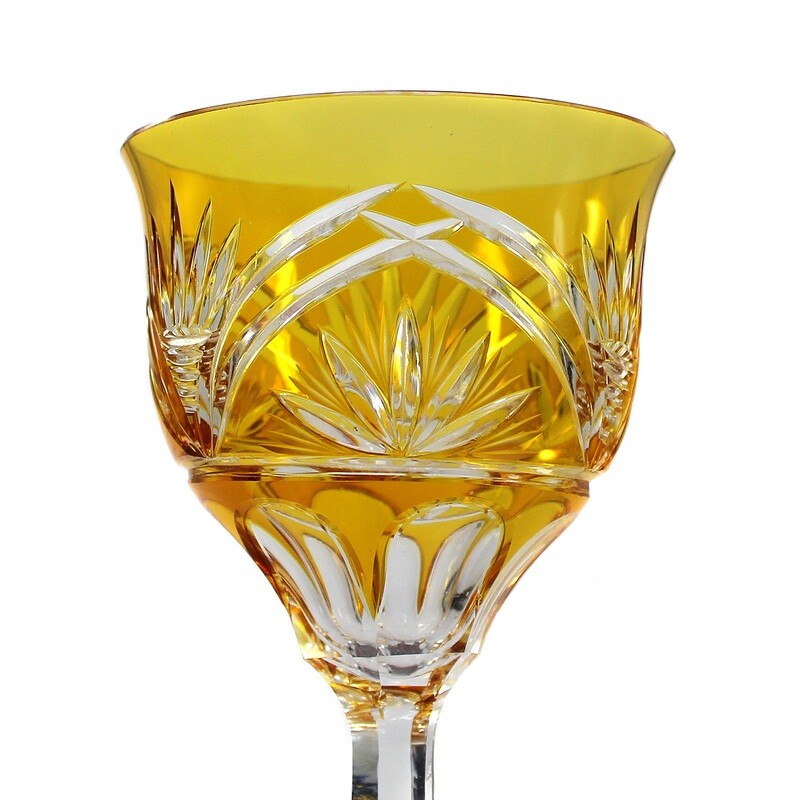 Stem glass with orange-yellow overlay and decorative cut decoration, around 1930