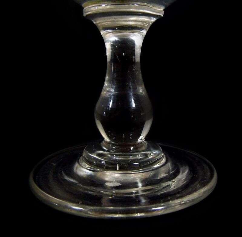 Southern wine glass with baluster shaft, bowl with arched facet, cupped. Demolition, 19th century