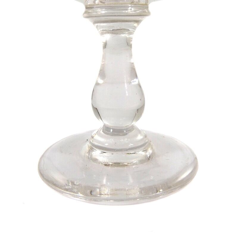 Southern wine glass with baluster shaft, ovoid bowl with curved facet, late 19th century.