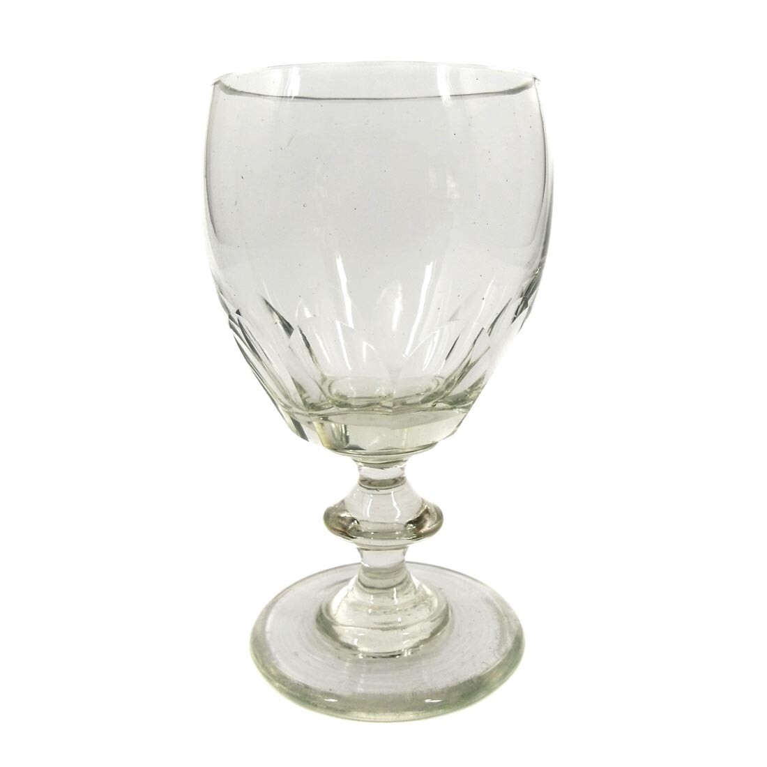 Goblet glass made of colorless glass with arched facets, pressed nodus, mid-19th century.