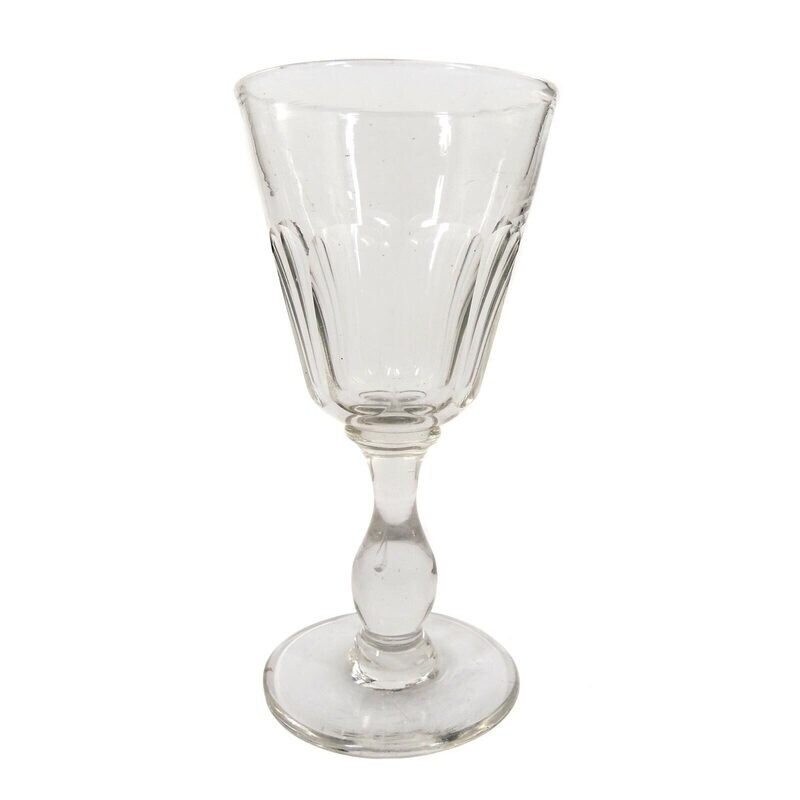 Southern wine glass made of colorless glass with baluster shaft &amp; arch facet, 19th century.