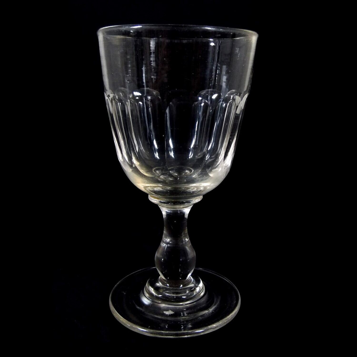 Southern wine glass with baluster shaft, bowl with arched facet, cupped. Demolition, 19th century