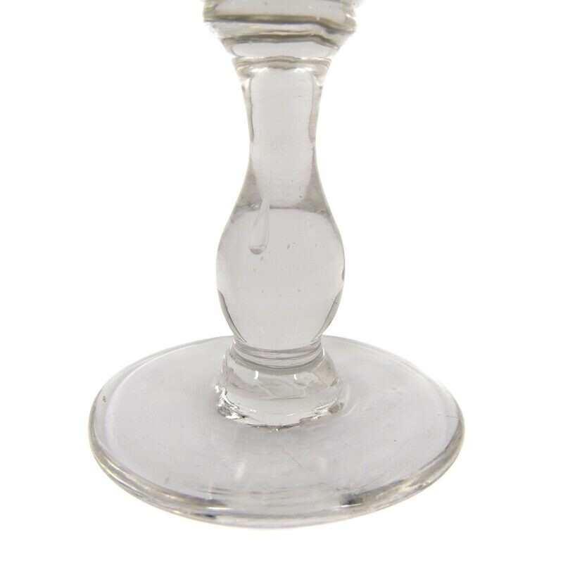 Southern wine glass made of colorless glass with baluster shaft &amp; arch facet, 19th century.