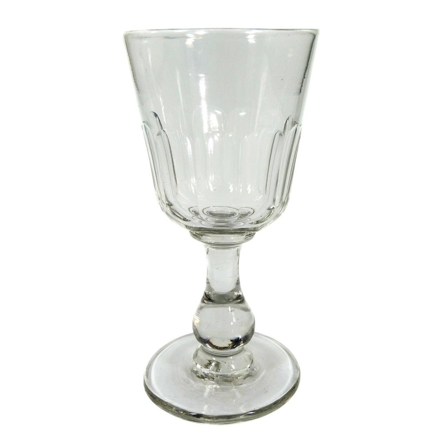 Southern wine glass made of colorless glass with baluster shaft &amp; arch facet, 19th century.