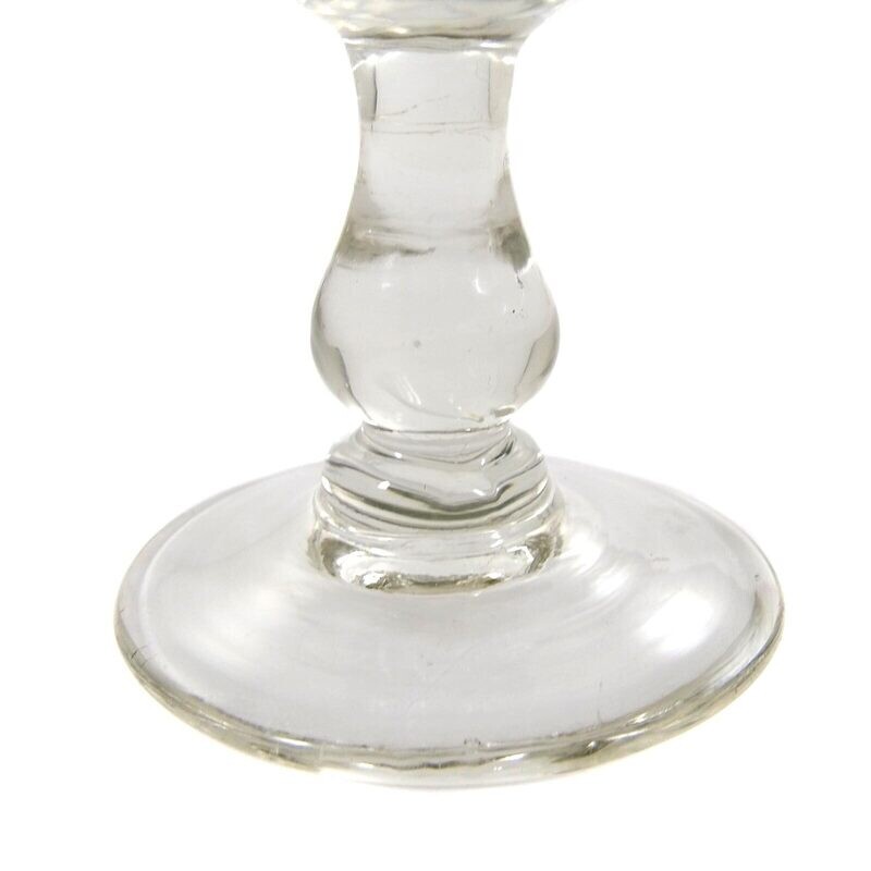 Southern wine glass with baluster shaft, conical bowl with curved facet, late 19th century.