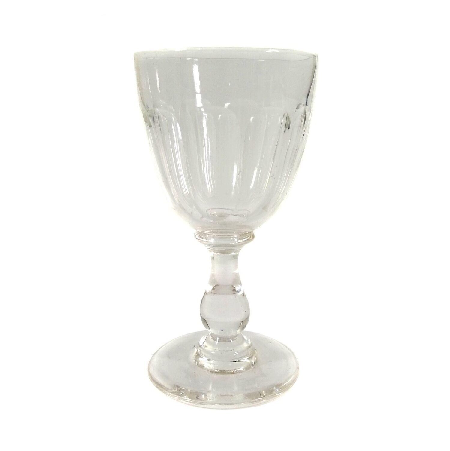 Southern wine glass with baluster shaft, ovoid bowl with curved facet, late 19th century.