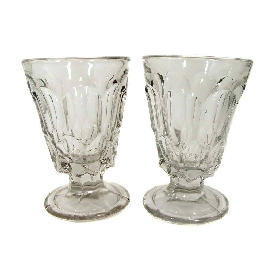 Pair of footed cups with a honeycomb look pressed into shape, around 1900
