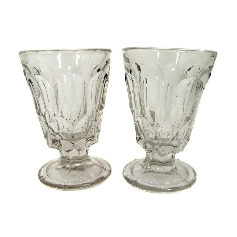 Pair of footed cups with a honeycomb look pressed into shape, around 1900