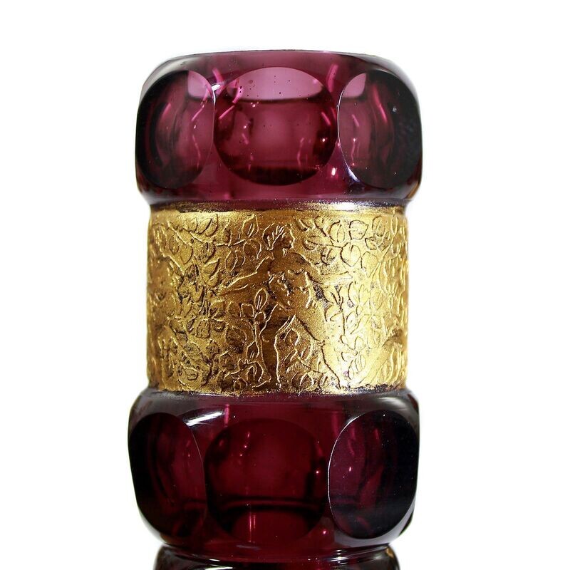 Pair of candle holders made of dark purple glass with gilded frieze, Bohemia around 1920