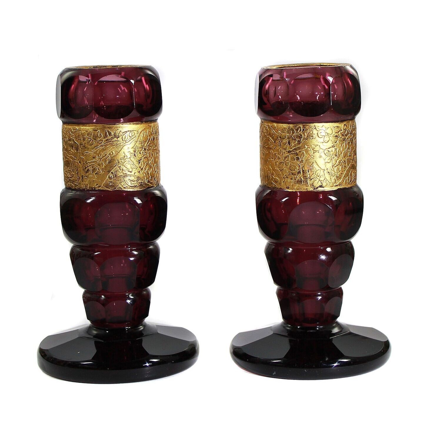 Pair of candle holders made of dark purple glass with gilded frieze, Bohemia around 1920