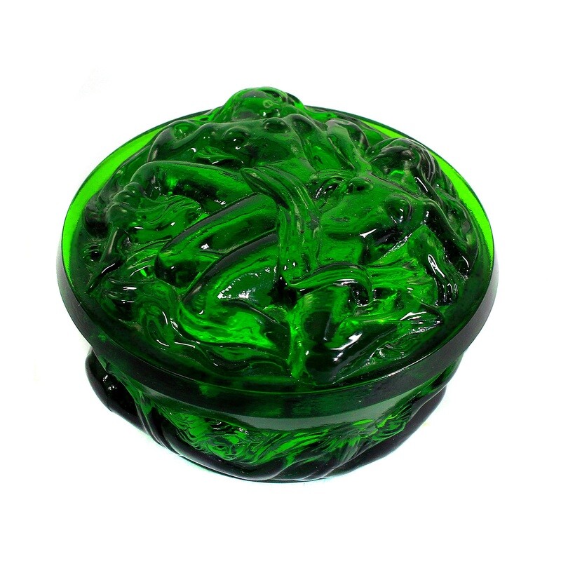 Lidded box made of dark green, transparent pressed glass with female files