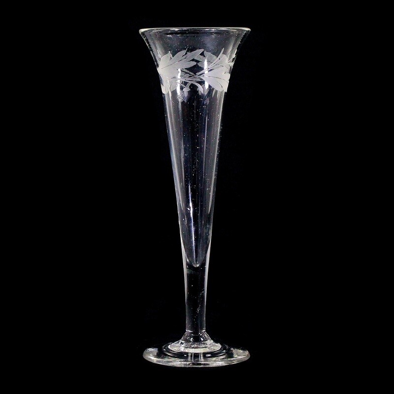 Champagne flute made of colorless glass with leaf border, North German around 1820